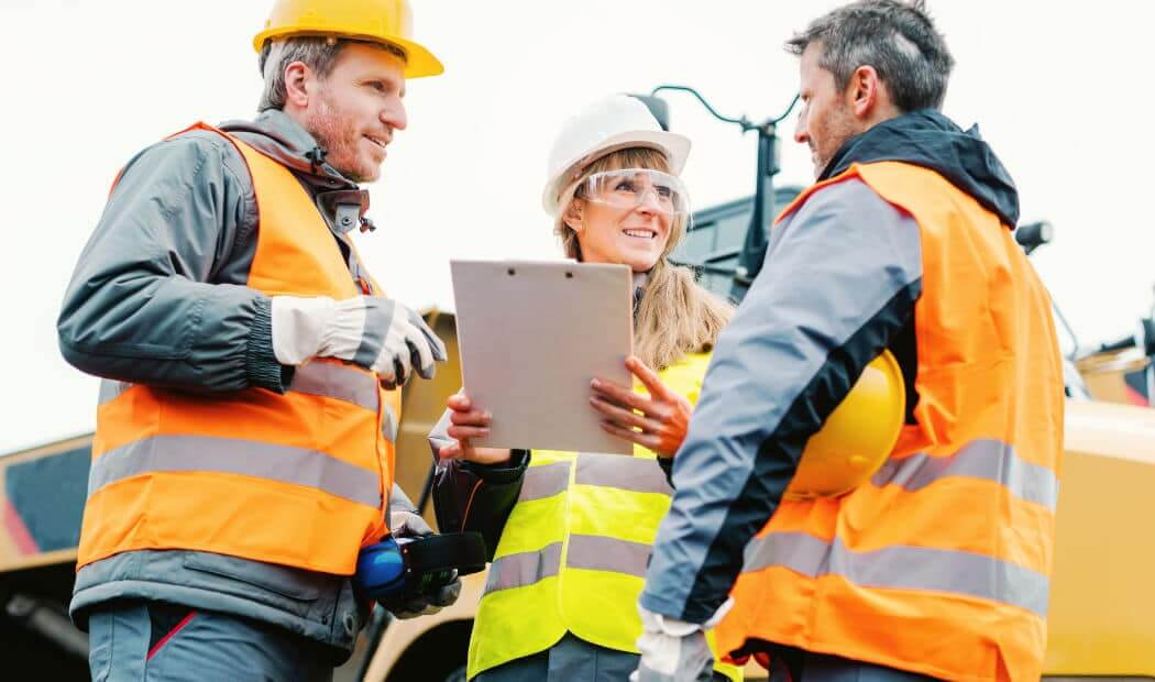 Workers dressed in PPE