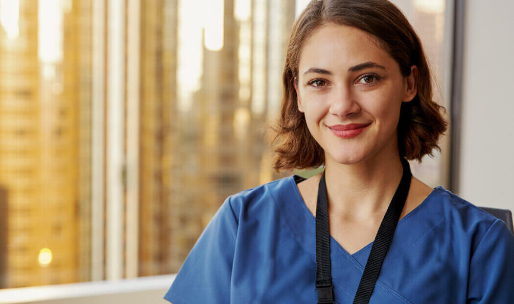 a young nurse looking contented