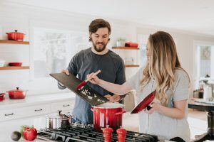 A Couple Preparing A Meal at Home