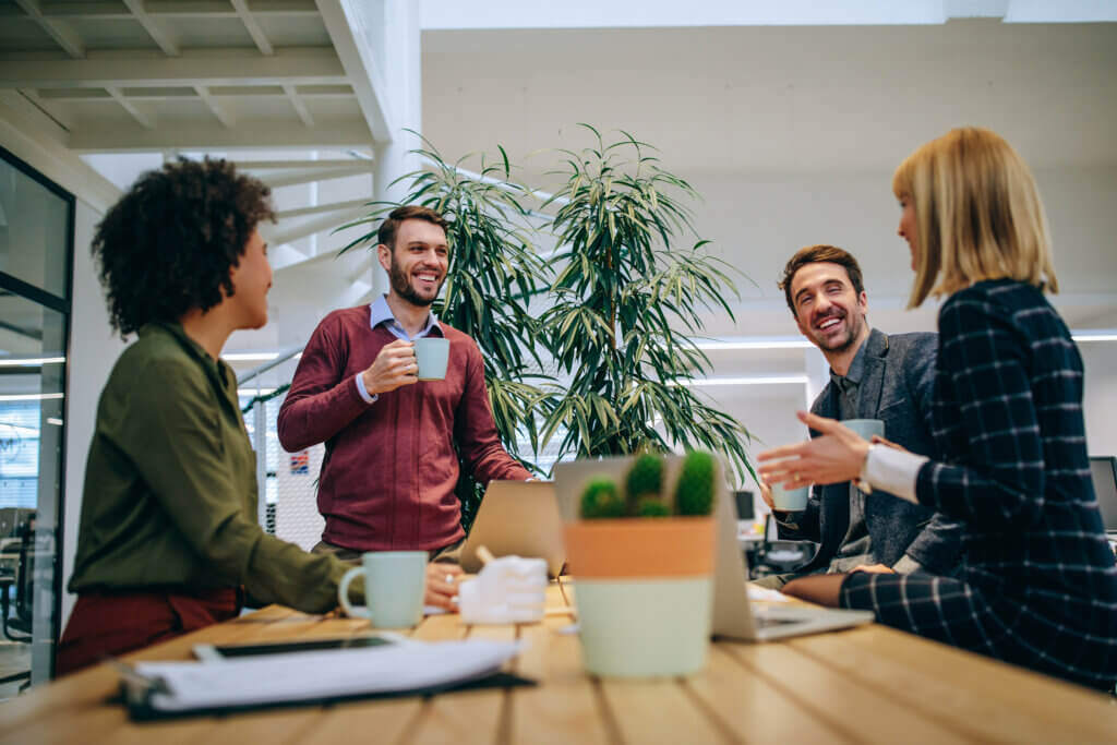 Image of positive workplace culture and team building chats.